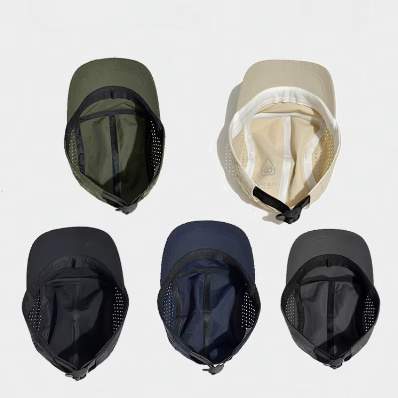 Five different colored caps on a light gray background