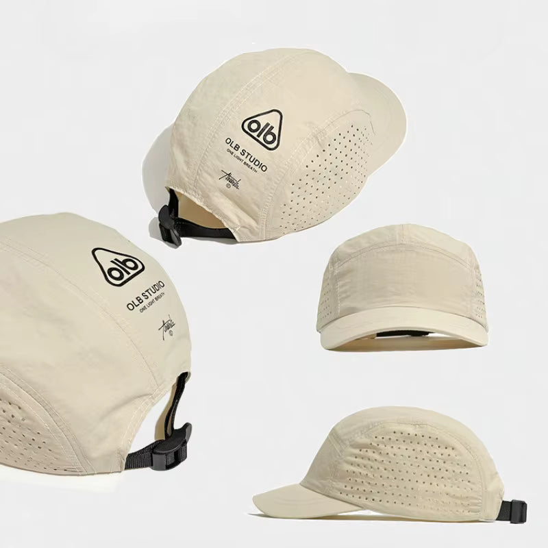Beige cap with black logo and text on a white background