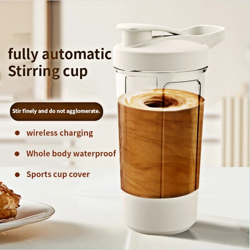 Fully automatic stirring cup with wooden and white design, containing a drink.